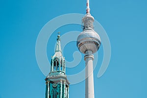 The Berlin Television tower Fernsehturm and Church St Mary in Berlin, Germany