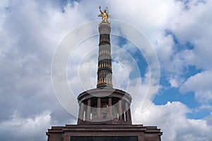 berlin victory column with a cloudy sky