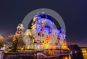 Berliner Dom Cathedral church illuminated at night, Berlin, Germany