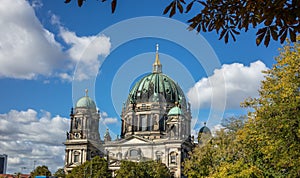 Berliner Dom, cathedral church on island museum in Berlin, Germany. Top part of monument and blue sky background