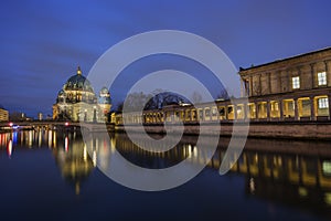Berliner Dom, Museum Island and Spree River in Berlin at dusk photo