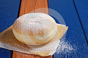 Berliner donut with powdered sugar