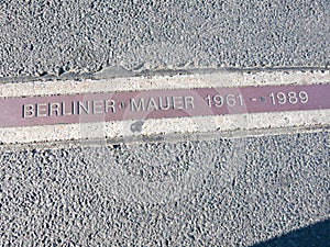 Berliner mauer german text means Berlin wall place sign with dates 1961 to 1989 in germany west and east separation