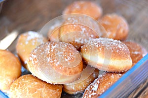 Berliners donuts in glass bowl