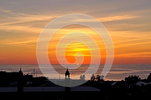 Bermuda harbor silhouette with a beautiful sunset.