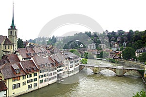 Bern's old town from Nydeggbruecke. Bern's quaint Old Town, a UNESCO World Cultural Heritage Site, is framed by the Aare river and