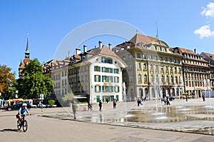 Bern, Switzerland - August 14, 2019: Bundesplatz, the square in the city center of the Swiss capital with people walking.