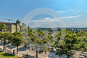 Bern, Switzerland - July 26, 2019: Panoramic view at sunny summer day. Swiss capital parliament building with green dome roof and