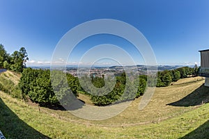 Bern, Switzerland - July 30, 2019: Aerial view of the swiss Capital from the top of Gurten Mountain Park. Pleasant sunny summer