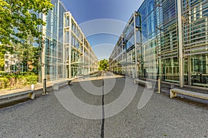 Bern, Switzerland - July 30, 2019: A modern metal concrete and glass mounted building in the Swiss Capital. Panoramic. View at