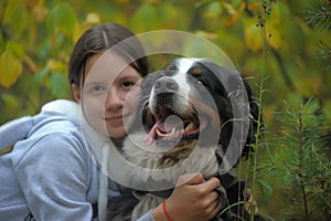 Bernese Mountain Dog and girl teenage girl