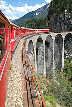 Bernina Express train on the Swiss alps