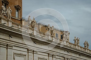 Bernini`s Saints Statues atop of St. Peter`s Square Colonnade, Vatican, Italy