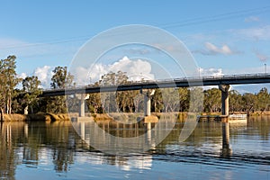 The Berri bridge crossing the over a calm river murray located in the river land at Berri South Australia on 20th June 2020