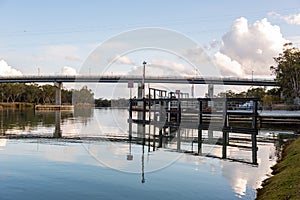 The Berri bridge and water treatment plant with calm river murray located in the river land at Berri South Australia on 20th June