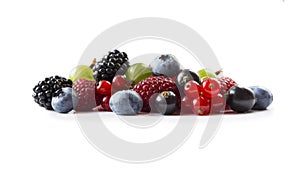 Berries isolated on white background. Ripe blueberries, blackberries, blackcurrants, raspberries, gooseberries and red currants. M