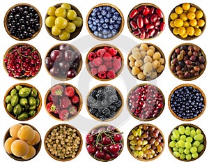 Berries isolated on white. Collage of different colors fruits and berries. Fruits and berries in bowl on white background. Sweet a