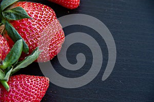 Berries of red garden strawberries