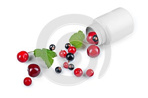 Berries spilling out of pills bottle