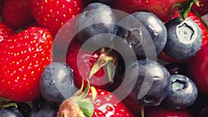 Berries. Various colorful berries background. Strawberry, Blueberry close-up backdrop, Bio Fruits, Healthy eating, diet.