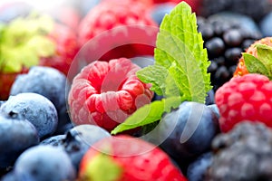 Berries. Various colorful berries background. Strawberry, raspberry, blackberry, blueberry closeup