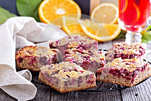 Berry cake bars with caramel almond topping