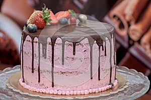 Berry cake with chocolate icing