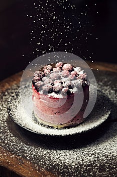 Berry cake with powdered sugar