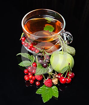 berry cuts tea on black background