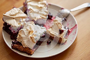 Berry dessert with black currant and meringue