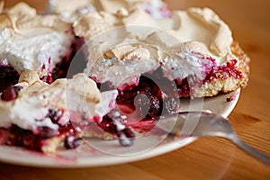 Berry dessert with black currant and meringue