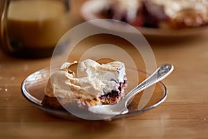 Berry dessert with black currant and meringue