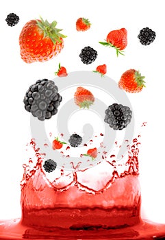 Berry falling in juice.