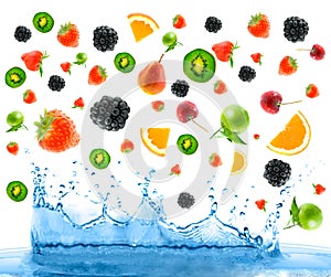 Berry falling in juice. Isolation