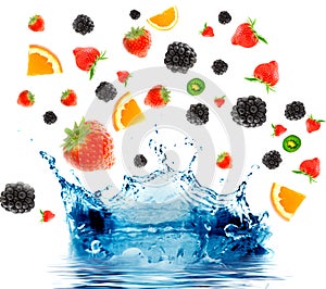 Berry and fruit falling in juice.