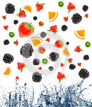 Berry and fruit falling in juice.