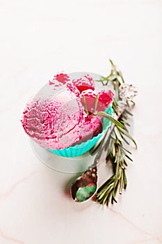 Berry ice cream in blue bowl