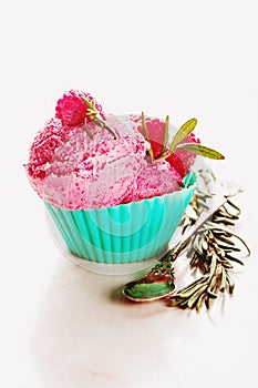 Berry ice cream in blue bowl