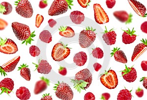 Berry pattern. Ripe fresh flying red strawberry, raspberries isolated on white background. Summer delicious sweet berry organic