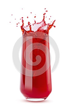 Berry red fresh juice in glass with bright colorful splashes, flying drops and swirl isolated on white background. Summer