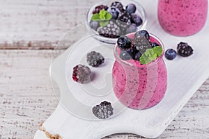 Berry smoothie, healthy detox yogurt drink, diet or vegan food c