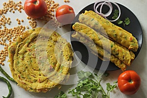 Besan chilla or chickpea pancakes. These are protein rich savoury pancakes made of besan flour or chick pea flour