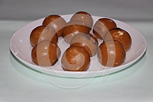 Besan Laddoo - Roasted gram flour mixed with Ghee and sugar to make round shape balls,  Indian sweets