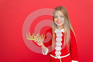 Best award for me. Kid hold golden crown symbol of princess. Happy childhood concept. Every girl dreaming become