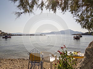 Best beaches of Pelion peninsula. Table and chair. Pagasetic gulf. Greece.
