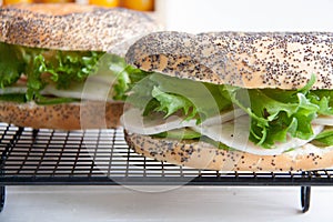 Bagel with chicken roll, green salad and cream cheese