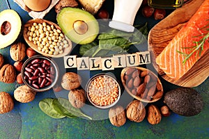 Best Calcium Rich Foods Sources. Healthy eating. Foods rich in calcium such as bean, almonds, hazelnuts, spinach leaves, cheese,