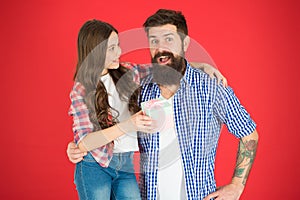 For best dad ever. Man bearded father and cute little girl daughter on red background. Celebrate fathers day. Family