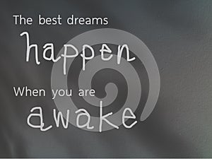 The best dreams happen when you are awake, quotee on grunge concrete background