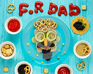 Best Father`s Day brunch idea - funny face sandwich with black c